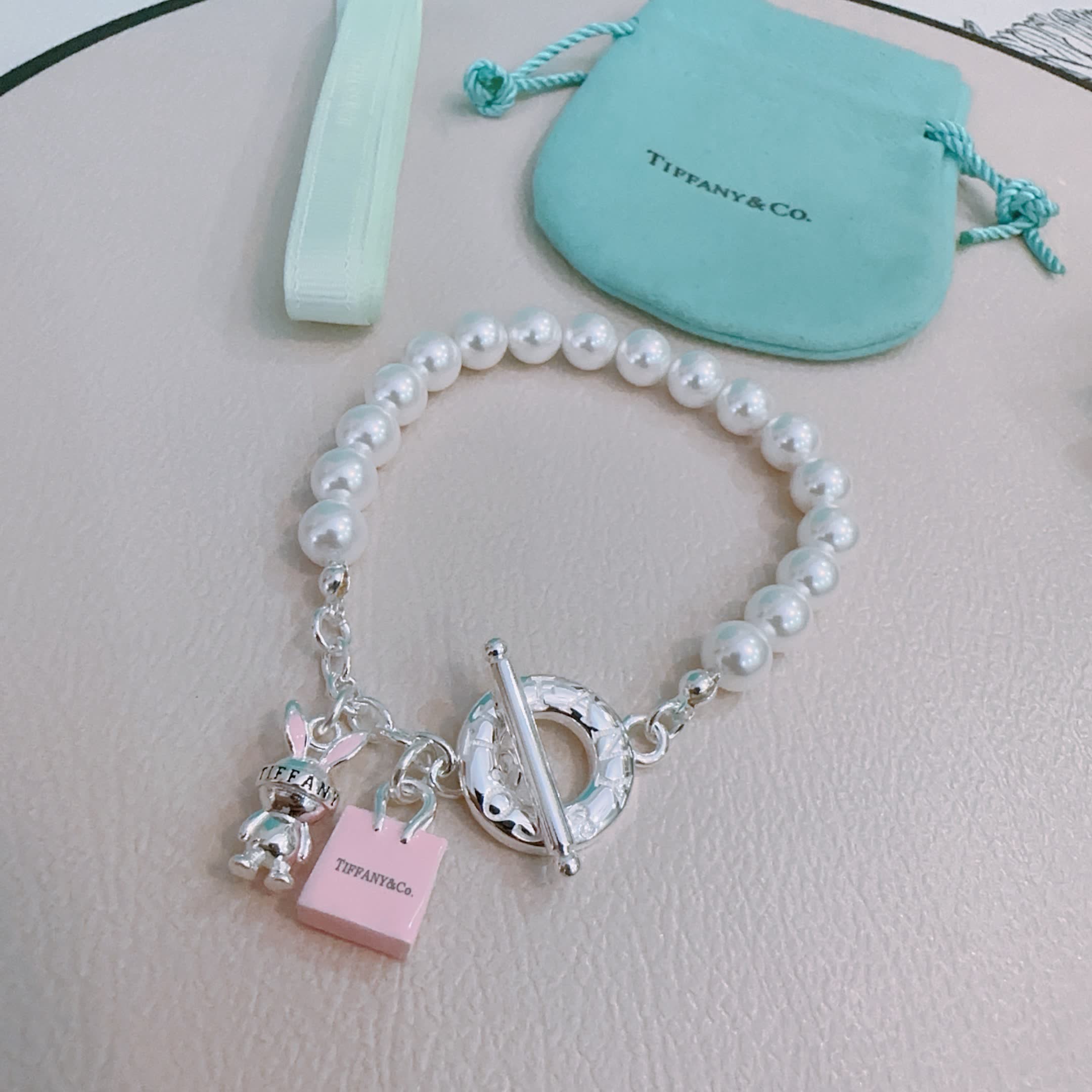 Tiffany & Co. Pearl Bracelet with Toggle Clasp and Charms
